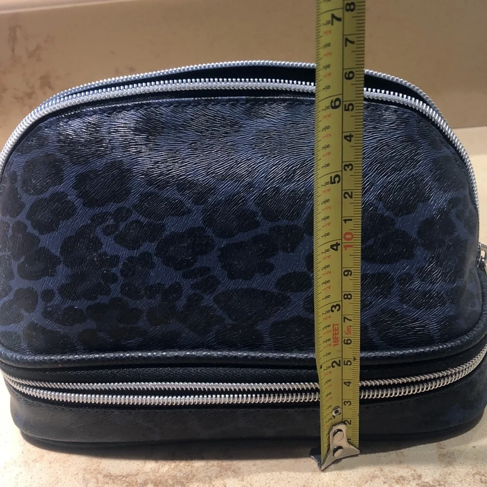 NWT cosmetic case in fantastic leopard print